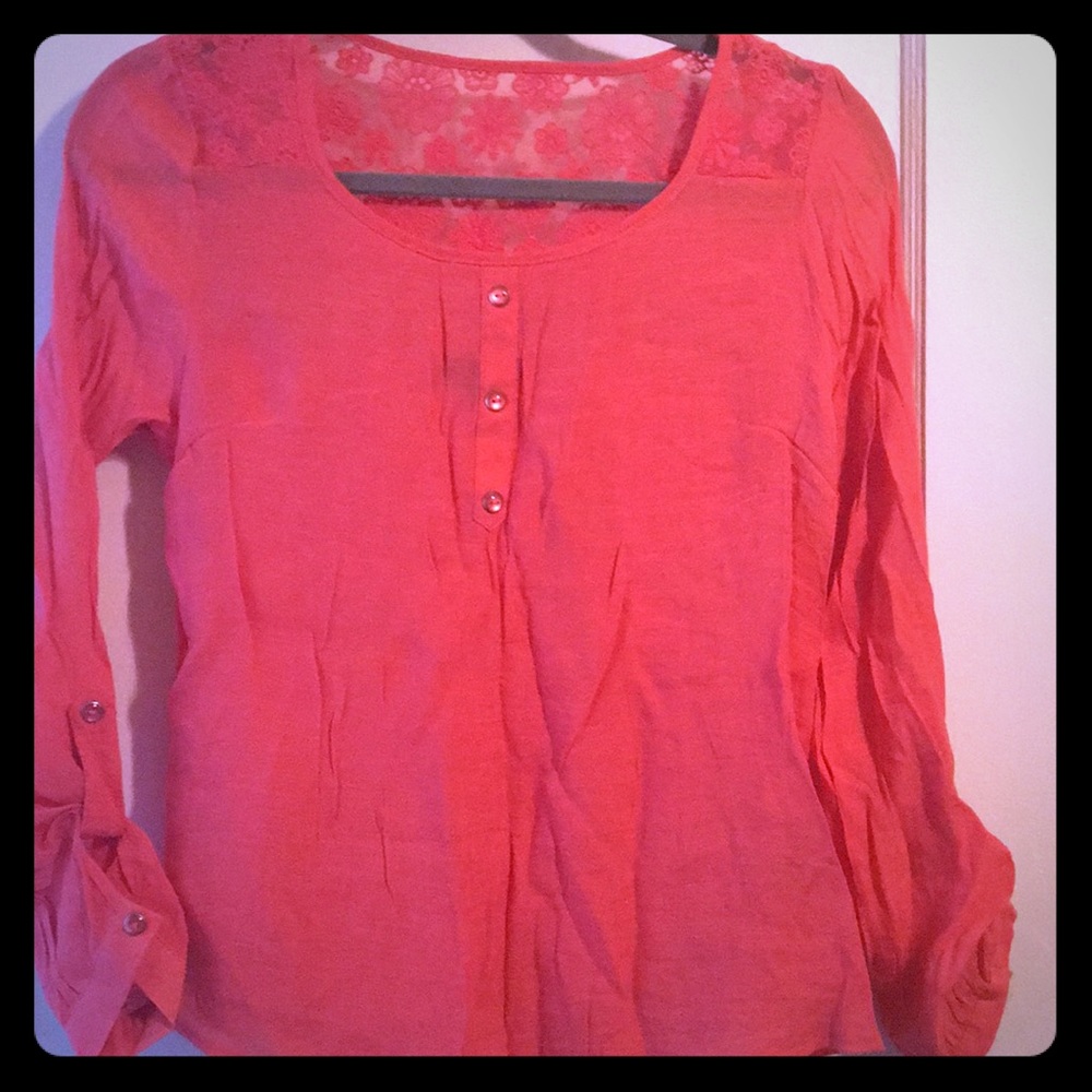 Coral colored blouse